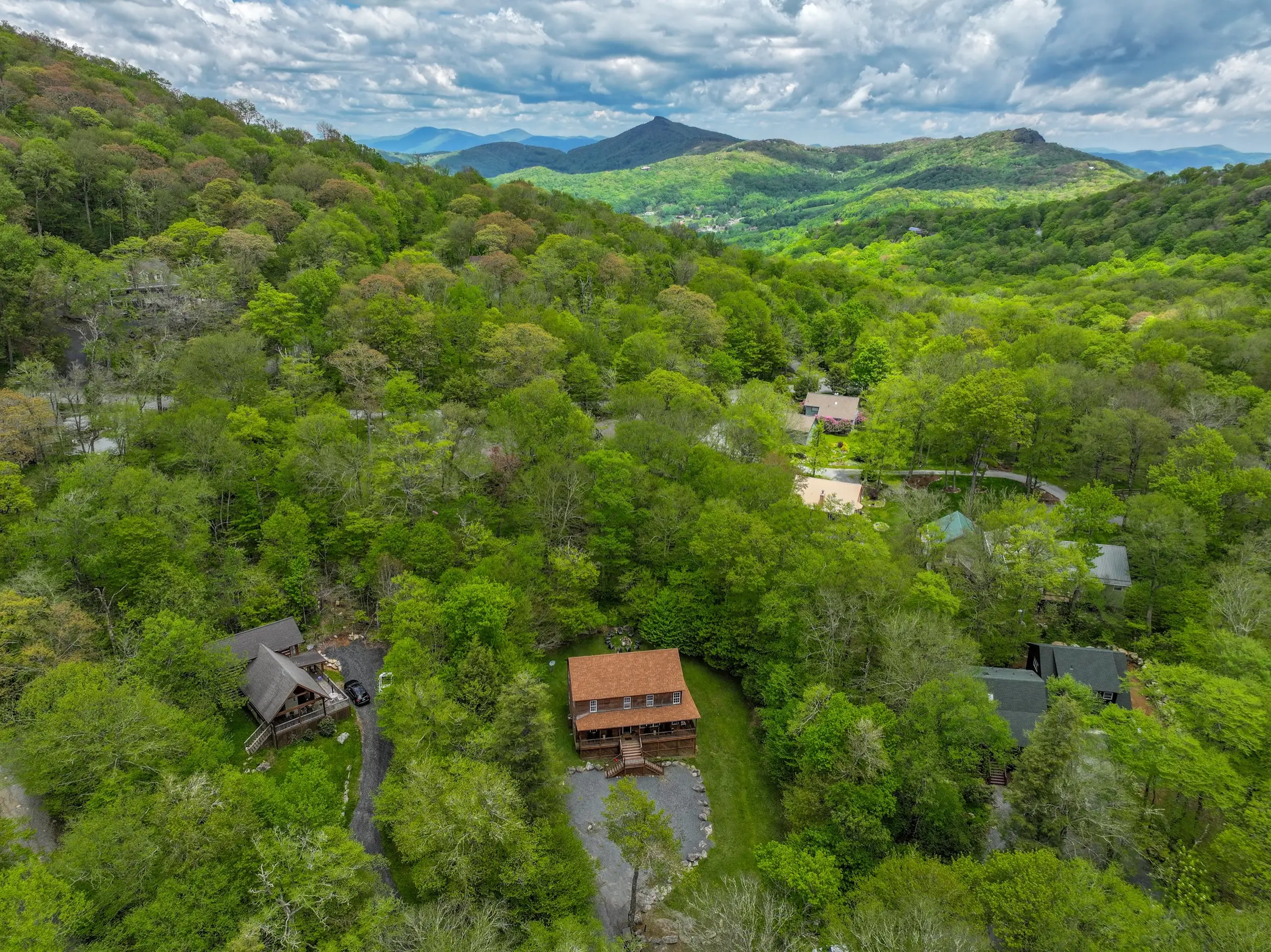 An aerial view of The Sugar Nest in its wooded mountain setting.